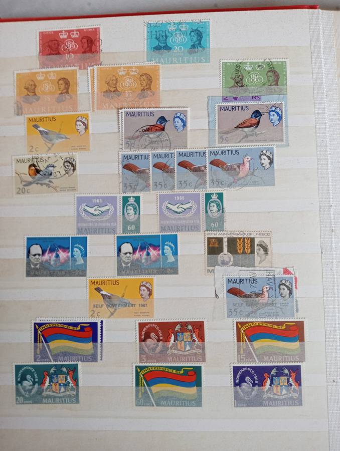 MAURITIUS AND SEYCHELLES IN A STOCK BOOK-MANY EARLY USEFUL,KGVI SEYCHELLES HAS TONING -CONDITION ISS
