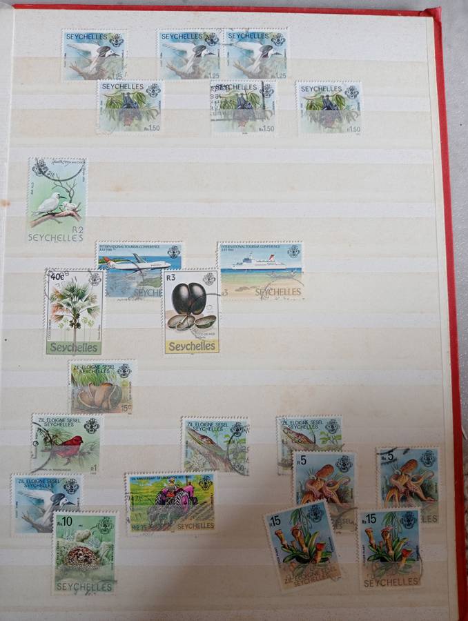 MAURITIUS AND SEYCHELLES IN A STOCK BOOK-MANY EARLY USEFUL,KGVI SEYCHELLES HAS TONING -CONDITION ISS