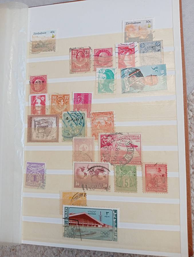 TWO VERY USEFUL STOCK BOOKS-ONE JAMMED WITH WORLD MANY EARLIES,OTHER GOOD CYPRUS SEE BELOW