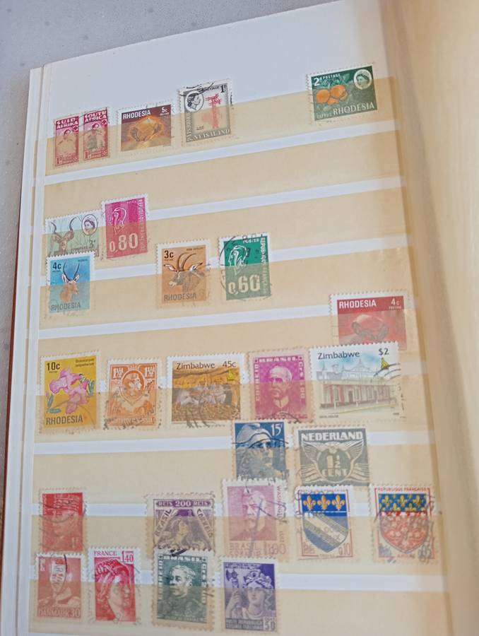 TWO VERY USEFUL STOCK BOOKS-ONE JAMMED WITH WORLD MANY EARLIES,OTHER GOOD CYPRUS SEE BELOW