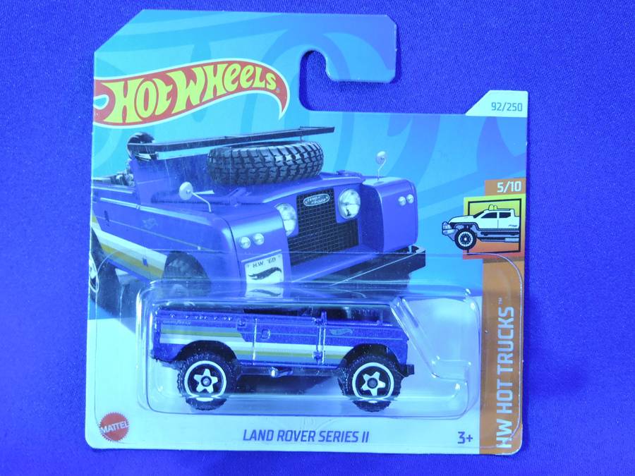 Hot Wheels LAND ROVER SERIES 11 ( Blue with surf board )