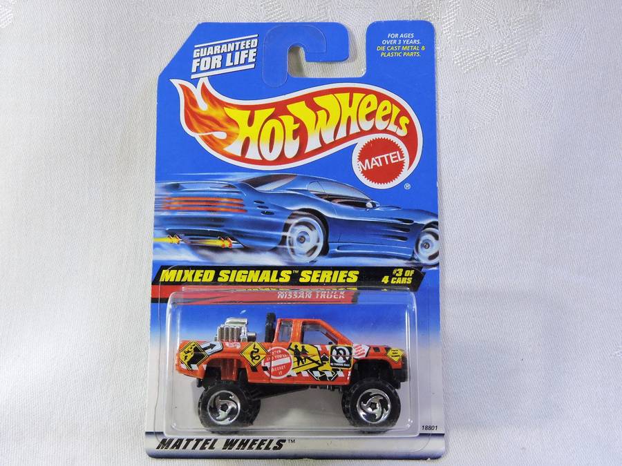 Hot Wheels NISSAN Truck Pickup Bakkie ( Orange ) Long Card  Like Datsun