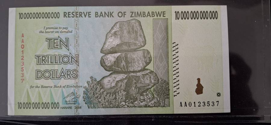 RESERVE BANK OF ZIMBABWE  10 TRILLION DOLLARS   2008 SERIAL NUMBER AA0123537  UNCIRCULATED