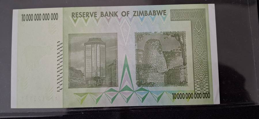 RESERVE BANK OF ZIMBABWE  10 TRILLION DOLLARS   2008 SERIAL NUMBER AA0123537  UNCIRCULATED