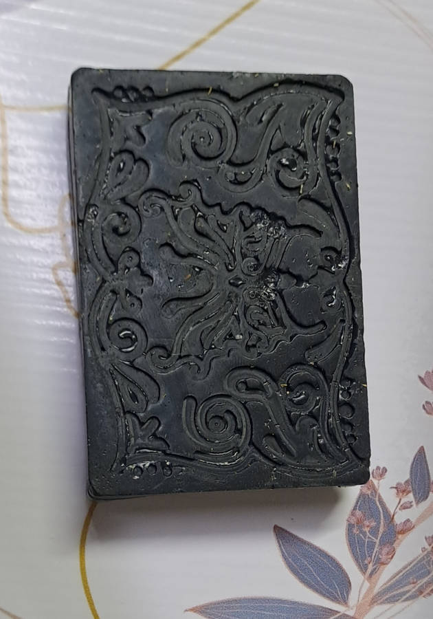 Natural non-toxic oat milk soap infused with activated charcoal, tee tree and chamomile