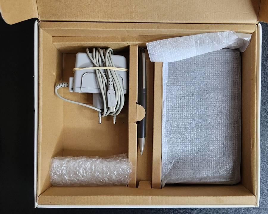 Nintendo DSi XL Console + Game Bundle