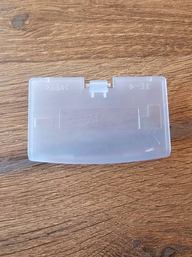 Nintendo Game Boy Advance battery cover (original, transparent blue)