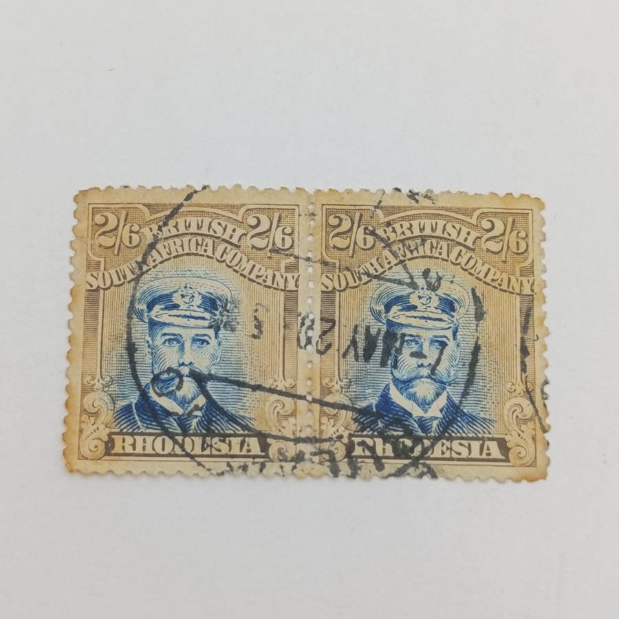 BSA Company SACC 236a pale blue pair of used 2/6 stamps