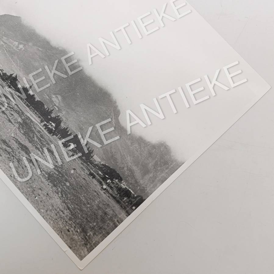 Antique photo reprint of horse cart next to Castle of Good Hope wall with Devils Peak in back
