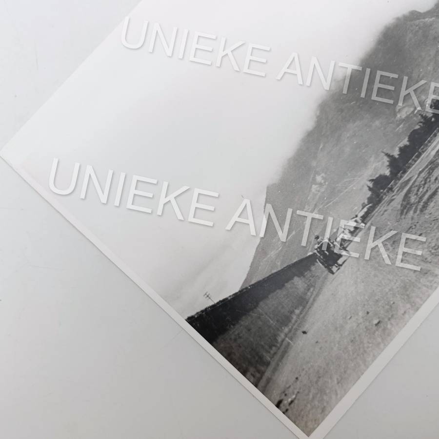 Antique photo reprint of horse cart next to Castle of Good Hope wall with Devils Peak in back