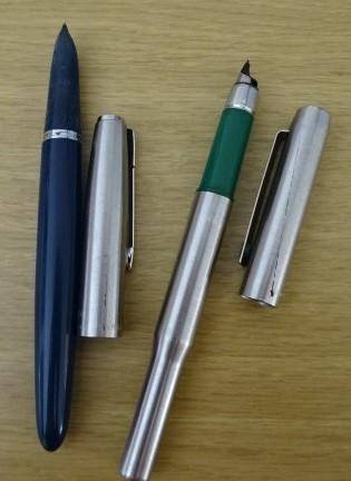 TWO FOUNTAIN PENS. BLUE ONE IS A PARKER
