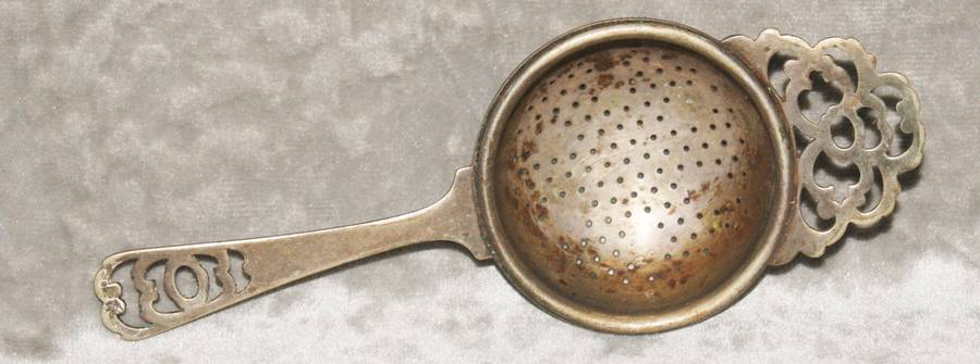 Vintage silver plated tea strainer