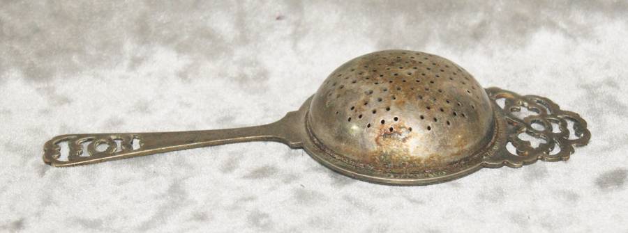 Vintage silver plated tea strainer