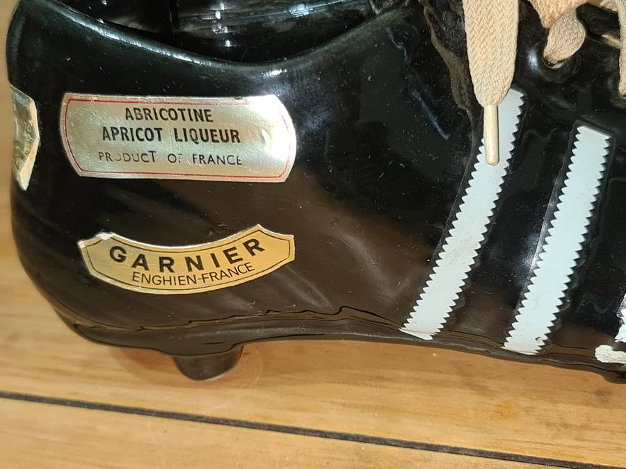 Liquor bottle in the shape of a rugby boot