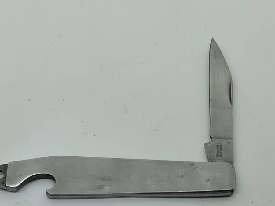 POCKET KNIFE: Stainless Hong Kong pocket knife and bottle opener