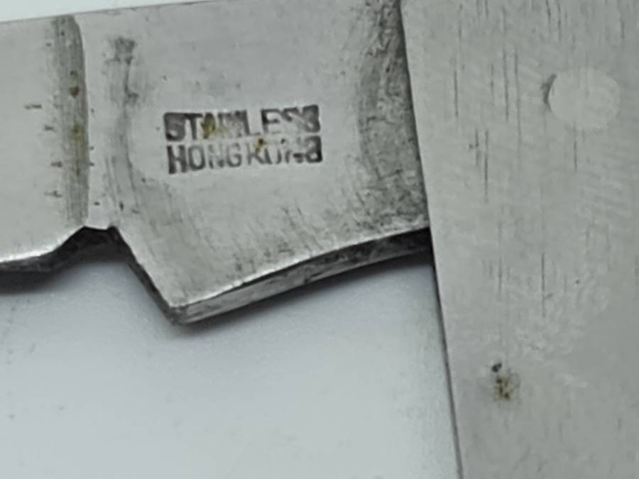 POCKET KNIFE: Stainless Hong Kong pocket knife and bottle opener