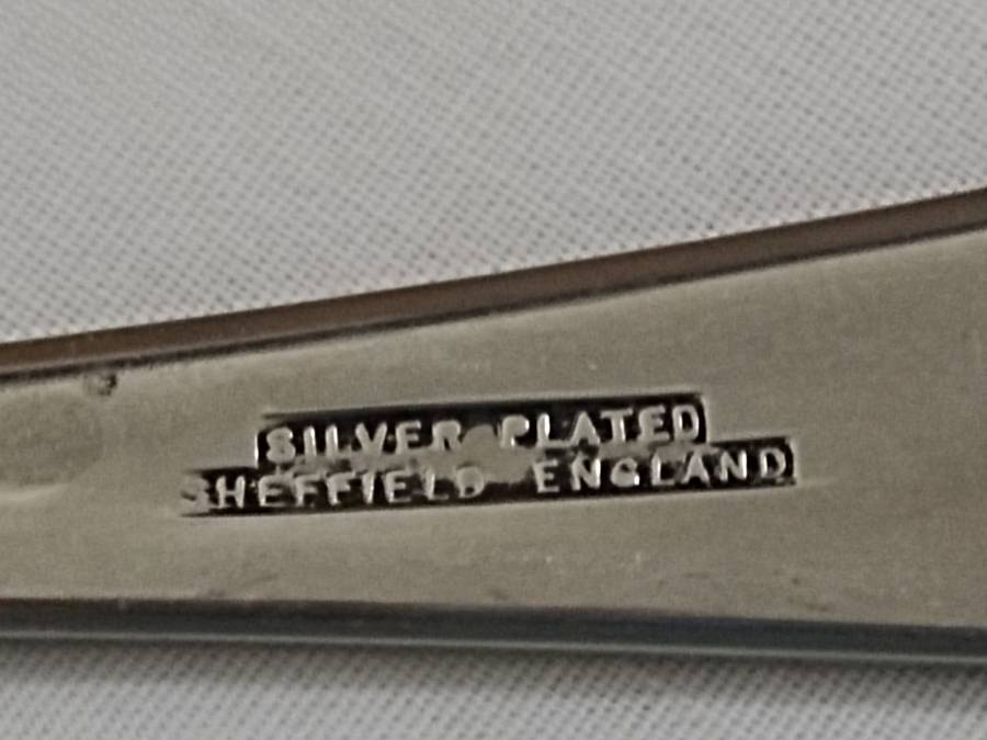 Two pairs of silver plated salad spoons