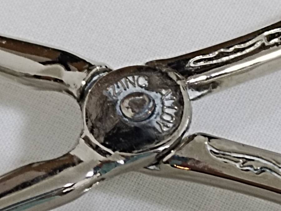 Silver plated bread/cake tongs Two Available Bid per item)