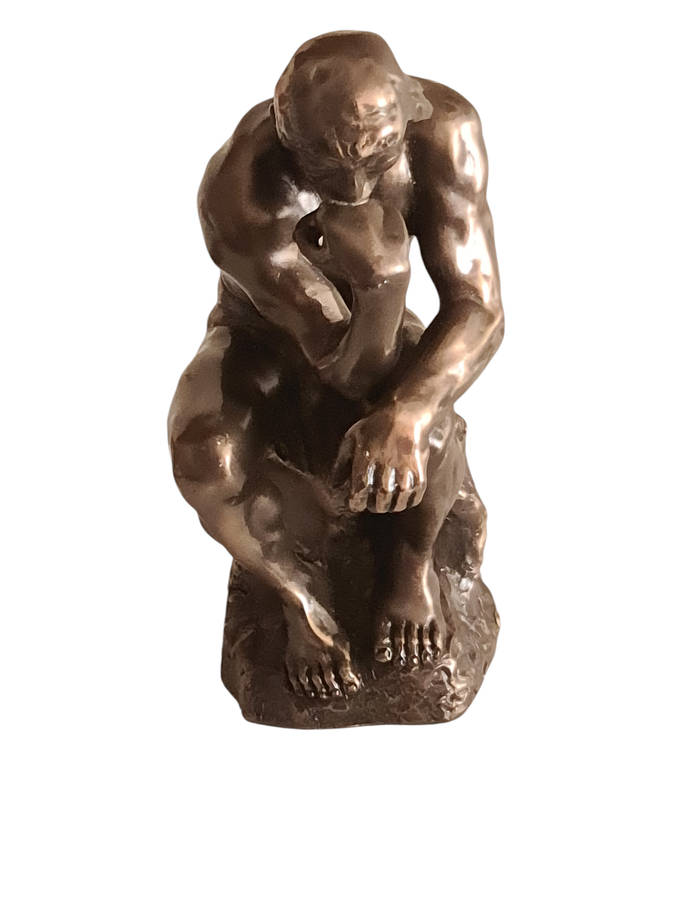 "THE THINKER" figurine. Signed