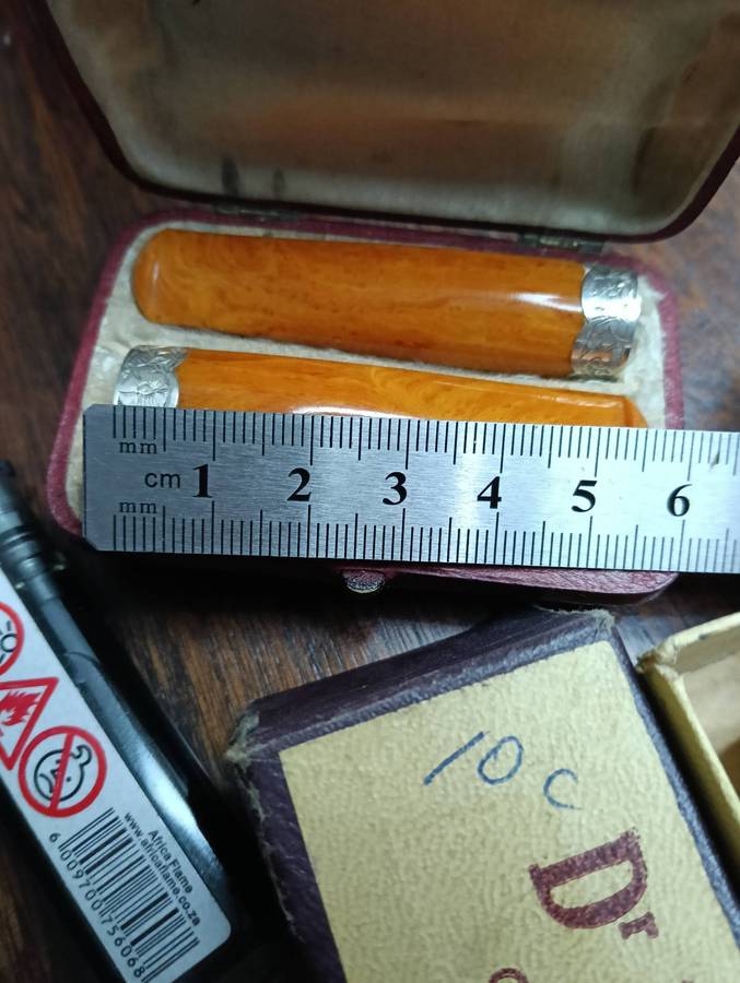 RARE, UNIQUE CIGAR AND CIGARETTE HOLDERS..