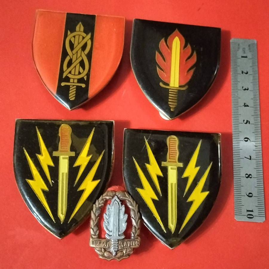 FIVE SADF ARMY BADGES.
