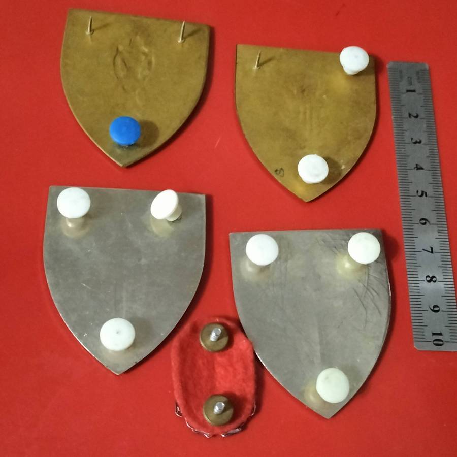 FIVE SADF ARMY BADGES.