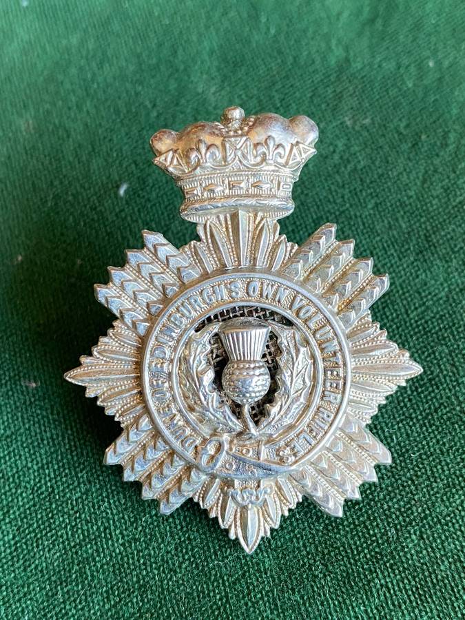 DUKE OF EDINBURGH'S OWN VOLUNTEER RIFLES WHITE METAL CAP BADGE-WORN 1902-1922-LUGS INTACT- MEASURES