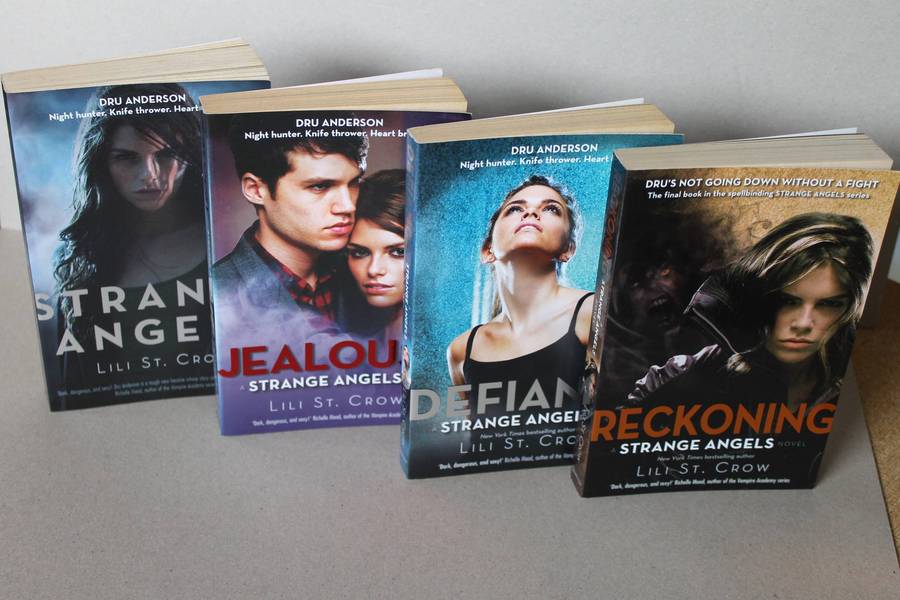 STRANGE ANGELS SERIES  Four titles: Strange Angels, Jealousy, Defiance and Reckoning by Lili St Crow