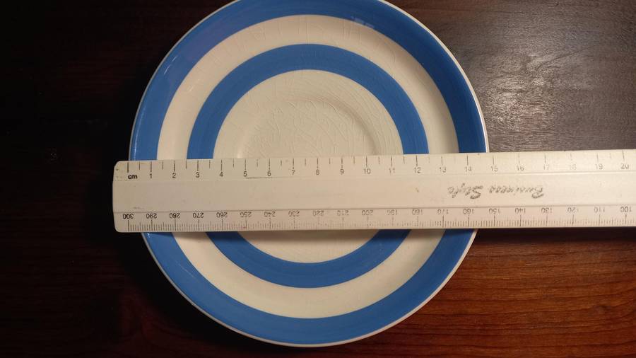 CORNISHWARE - KITCHEN WARE TEA CUP AND SAUCER