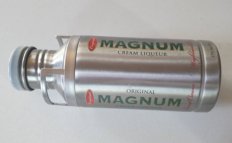 MAGNUM LIQUEUR tin as per photos