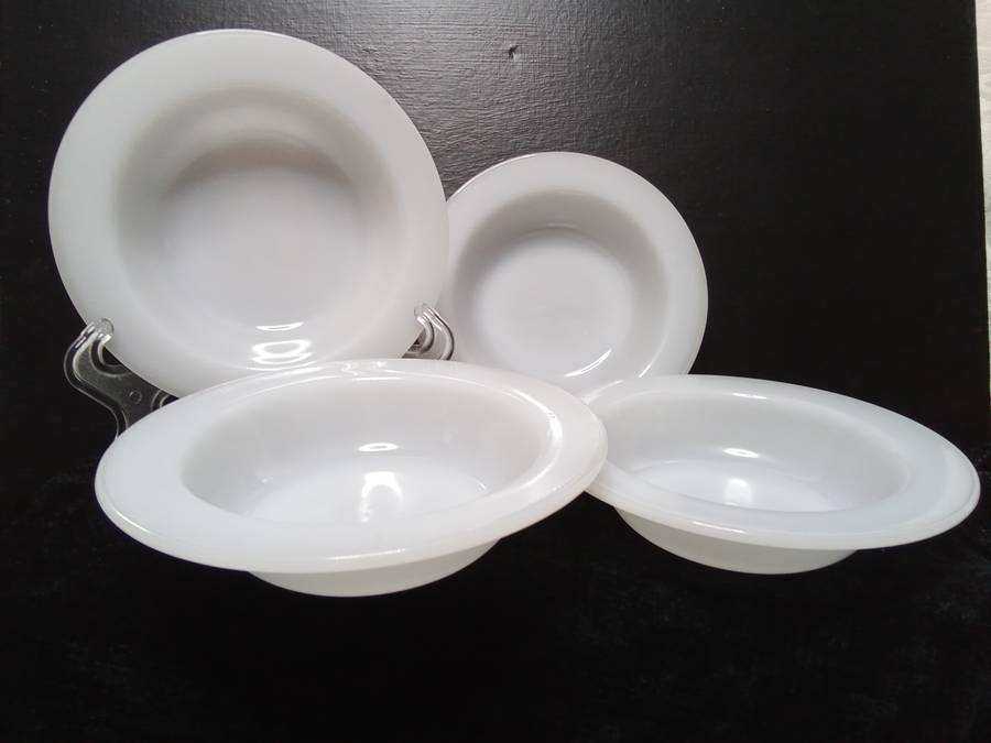 Four lovely white milk glass bowls