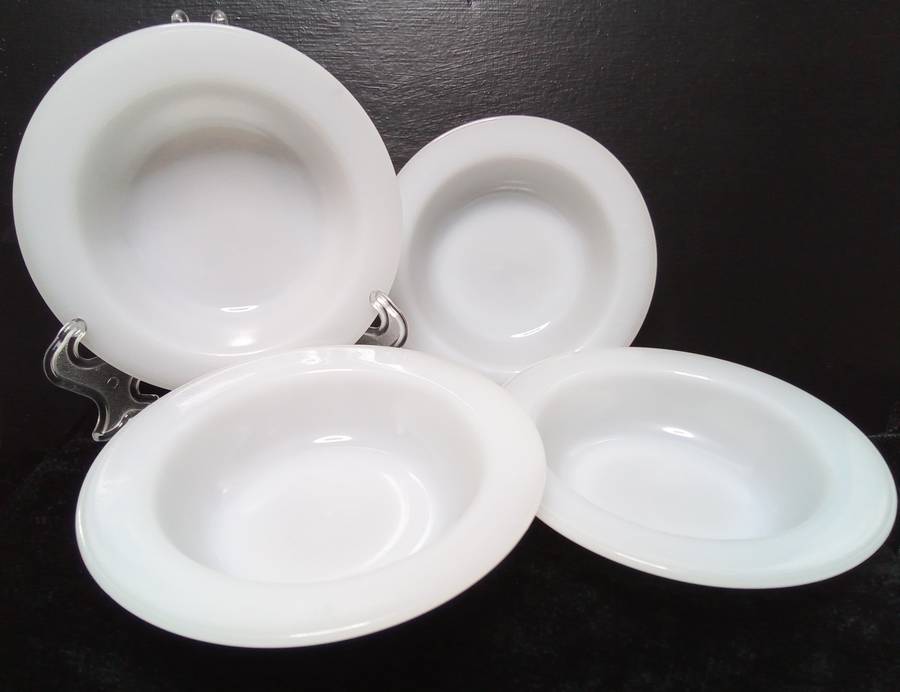 Four lovely white milk glass bowls