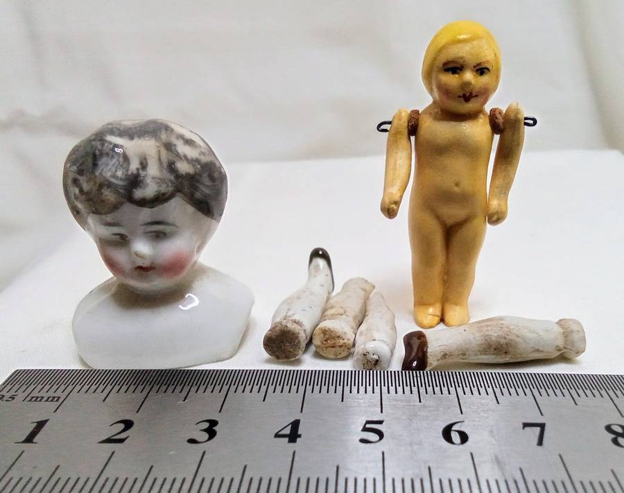 Two pretty vintage porcelain doll/pieces