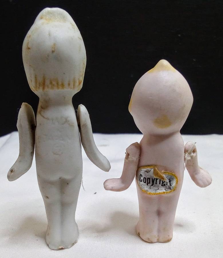 Two stunning vintage porcelain dolls in very good condition