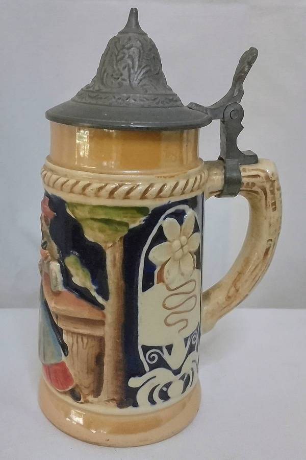 Stunning small vintage German beer stein with pewter lid