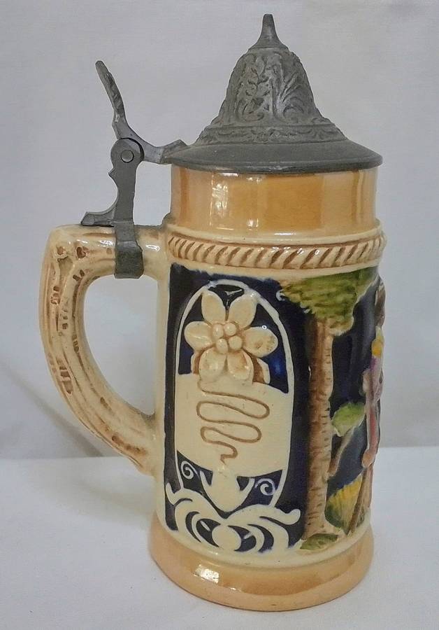 Stunning small vintage German beer stein with pewter lid