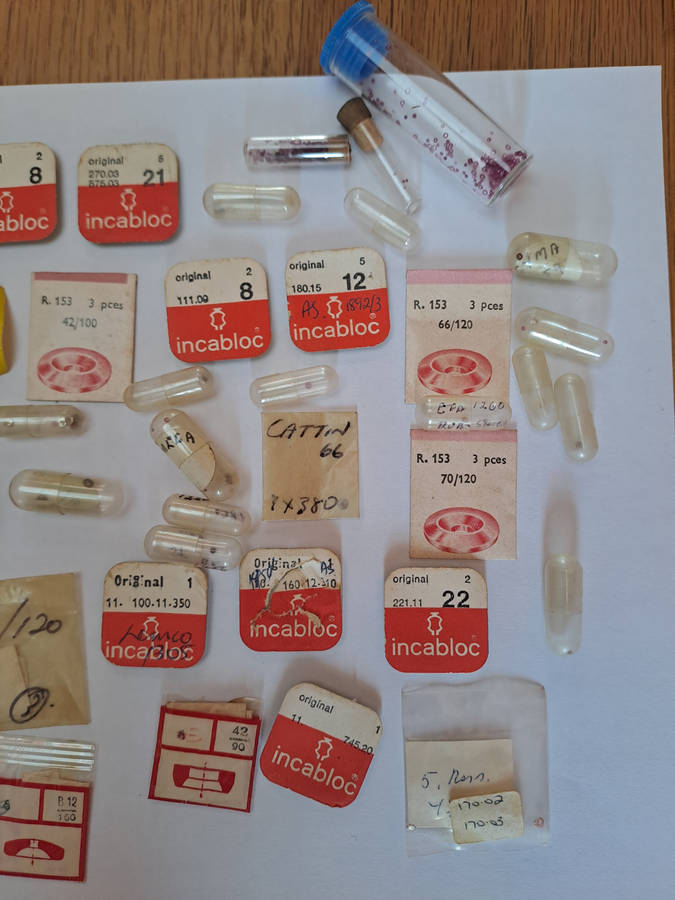 Lot of watch spares jewels springs settings Incabloc Favotite etc as per pictures