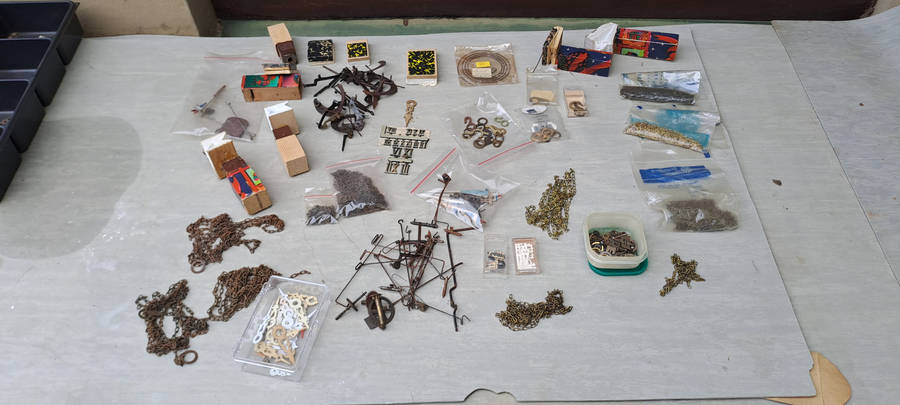 large lot of Cuckoo clock parts, chains, bellows, hands, etc
