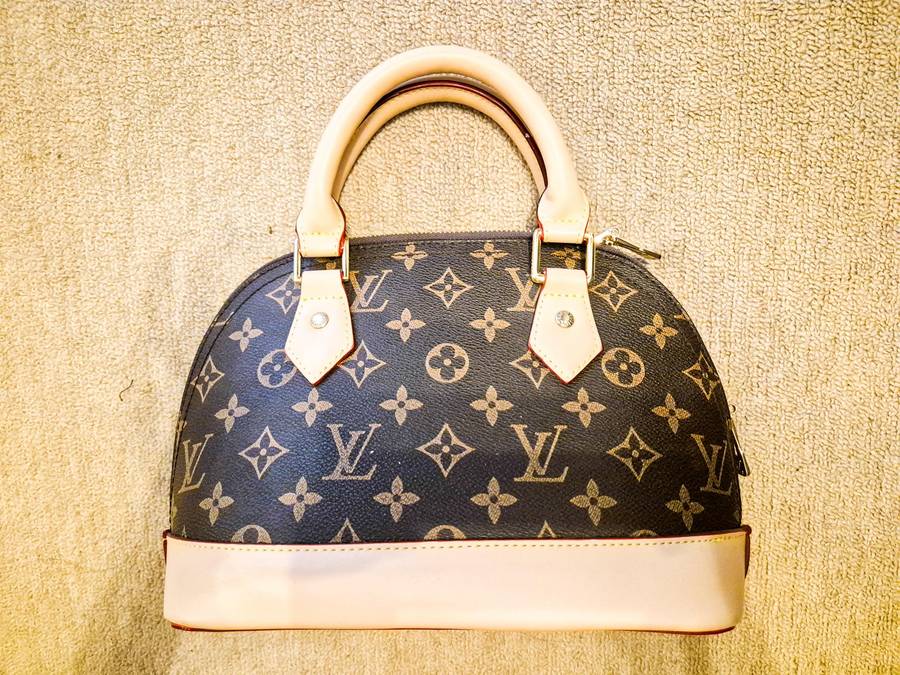 Louis Vuitton Alma BB Monogram Handbag