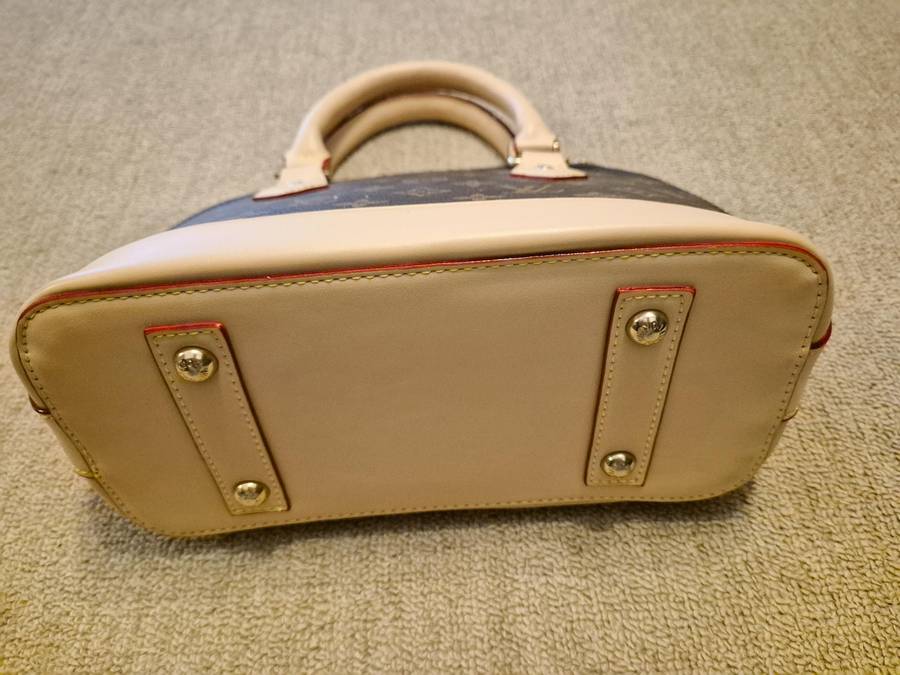 Louis Vuitton Alma BB Monogram Handbag