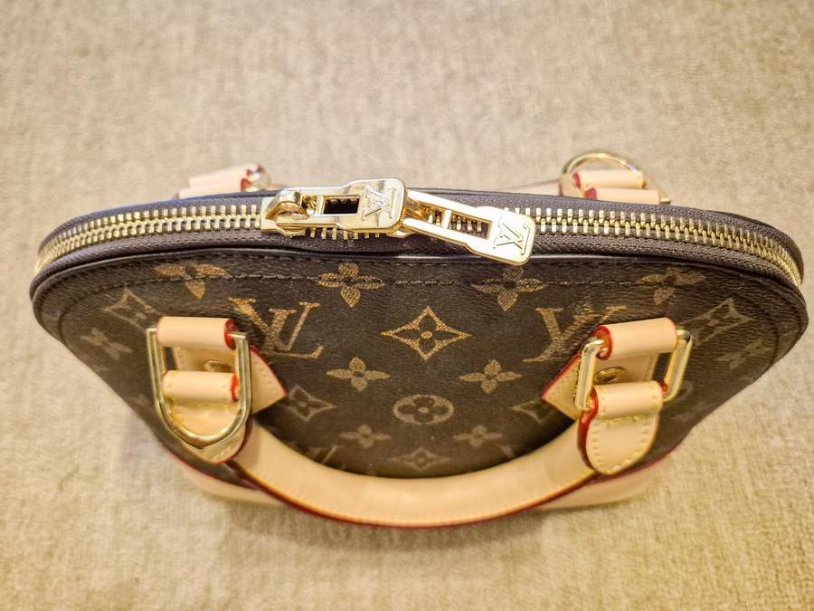 Louis Vuitton Alma BB Monogram Handbag