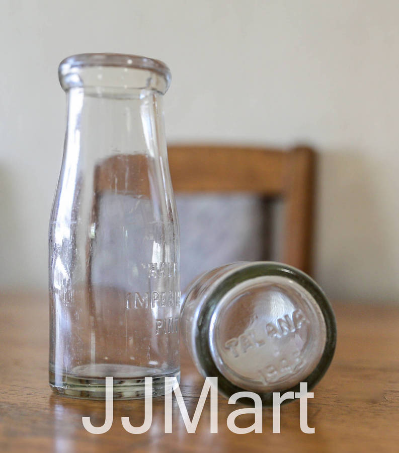 2 x Vintage 1945 Embossed Imperial Half Pint Bottle