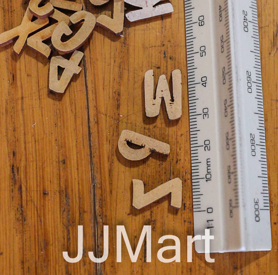 Box of cut out letters and numbers (+/- 1250 in total)