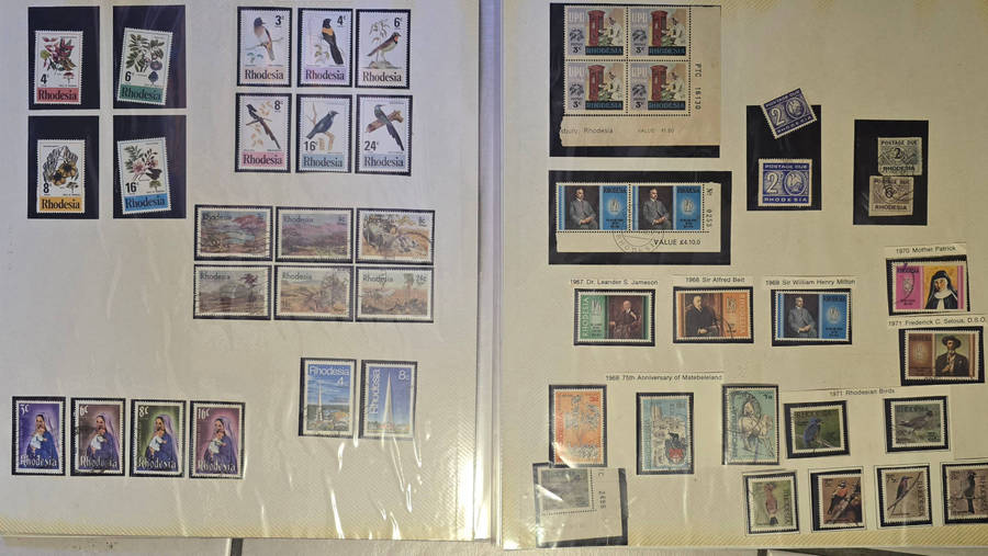 Rhodesia stamp lot with roya re album