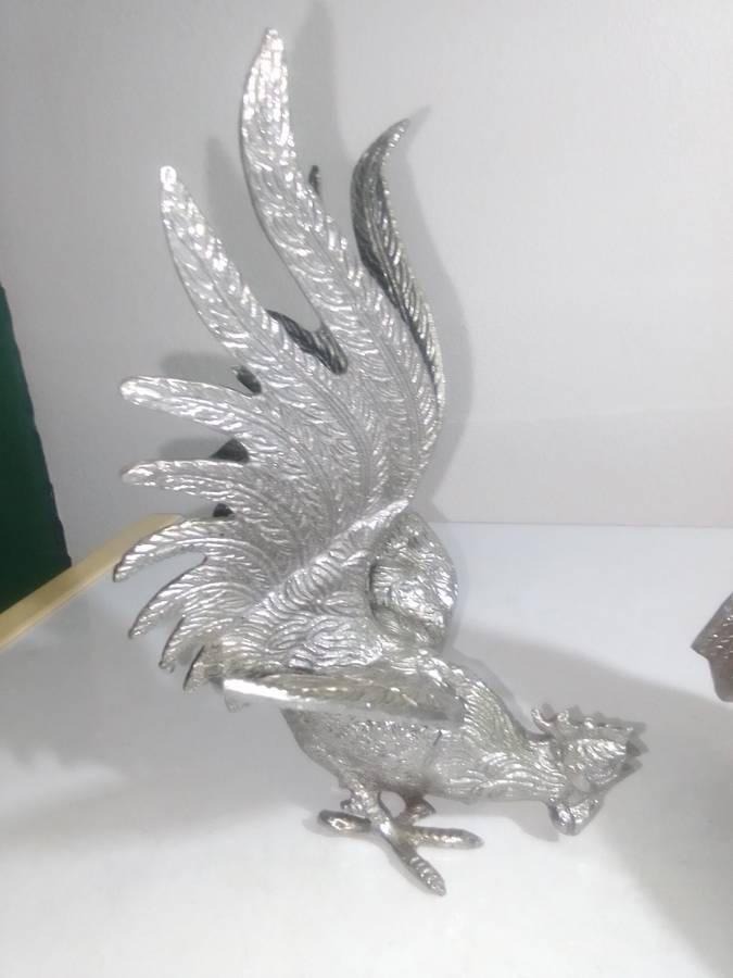 1950's A Vintage pair of fighting roosters. This pair is fierce! Silver plated over cast Brass.