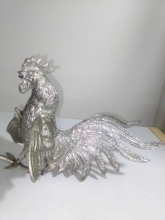 1950's A Vintage pair of fighting roosters. This pair is fierce! Silver plated over cast Brass.