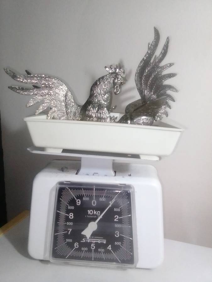 1950's A Vintage pair of fighting roosters. This pair is fierce! Silver plated over cast Brass.