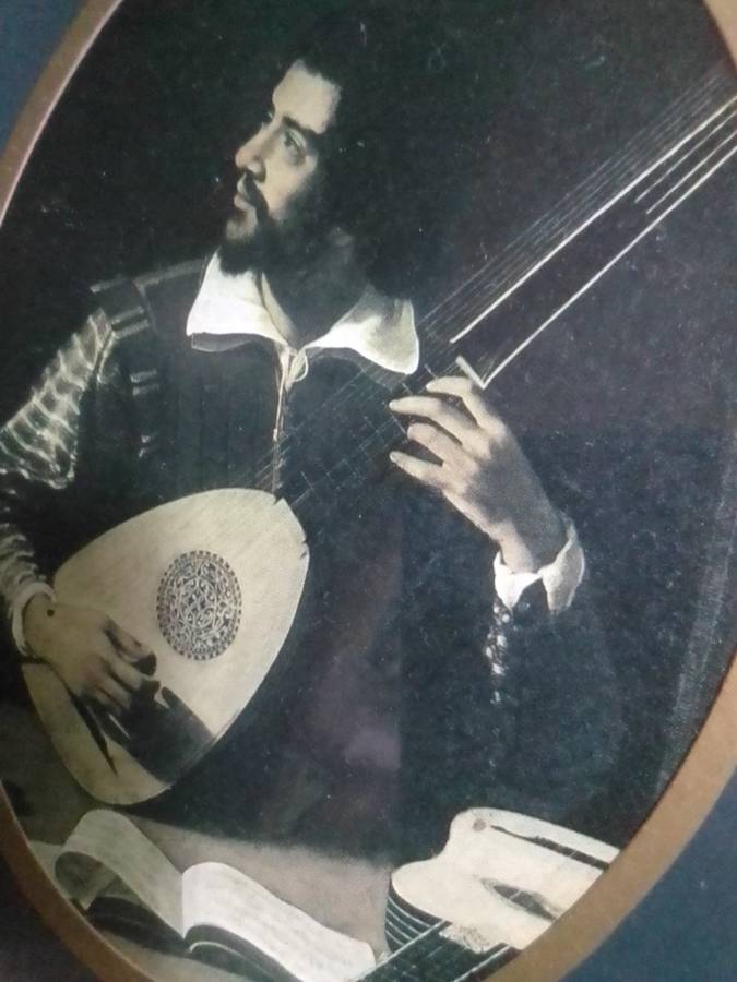 Medallion Wall Arts. Men at High finance and a musician earning his keep.