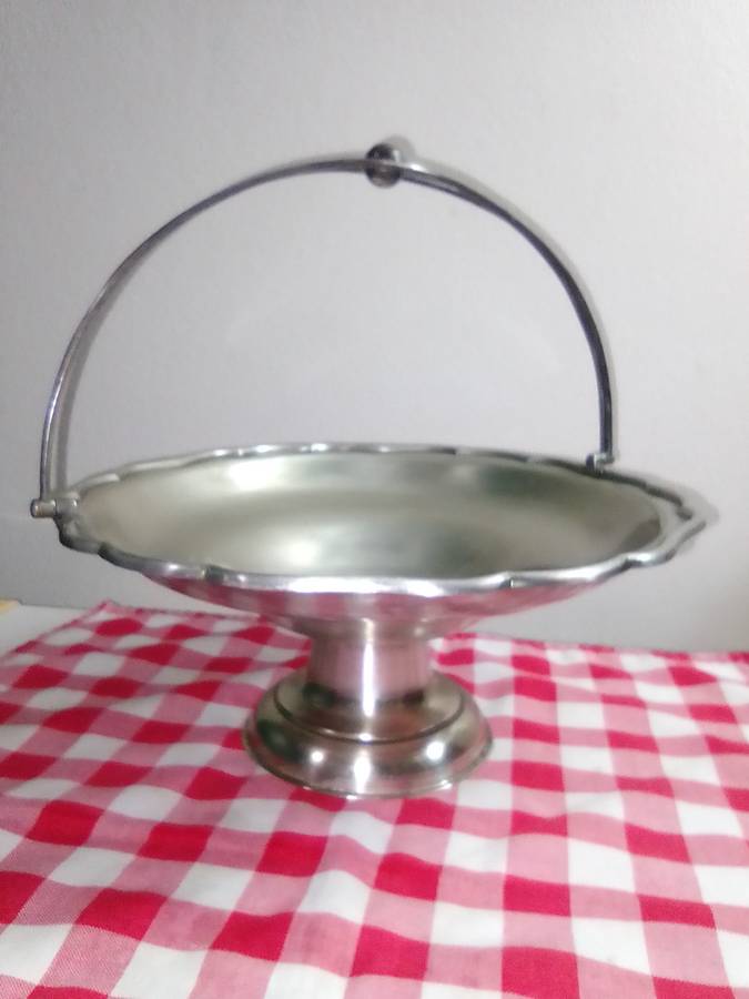 Victorian-style piece decorated with engraved patterns and designed for both appeal + functionality