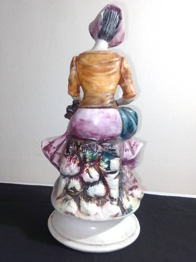 An elegant figurine from master Italian sculptor, A Farm Lady. Capodimonte made in Italy 285mm Tall